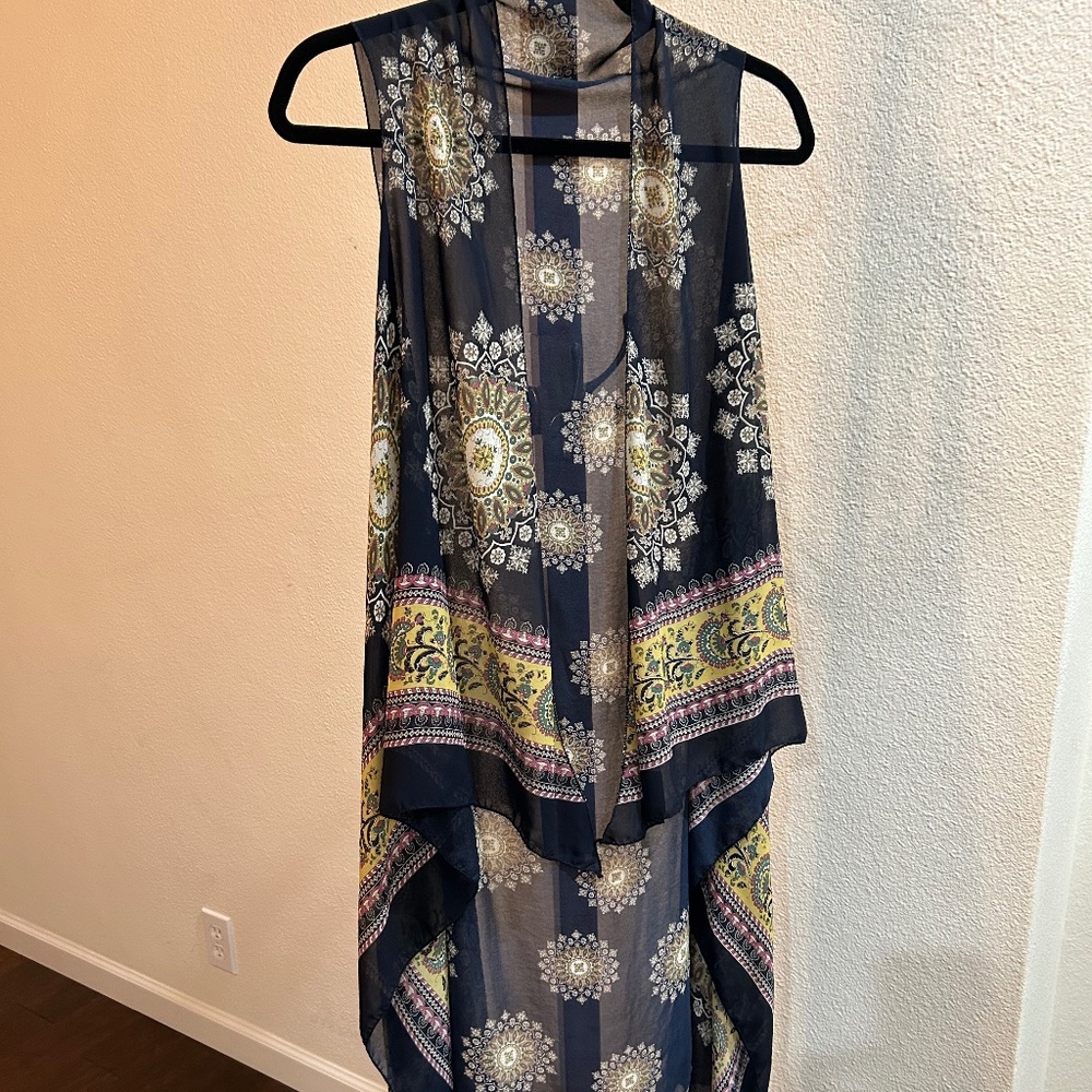 Extra long sheer sleeveless “vest” style kimono
